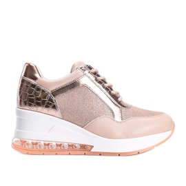 Lyserøde guldsneakers på Jimena -kilen