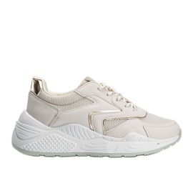 Beige sneakers med en tyk sål med metalliske Kenna -detaljer