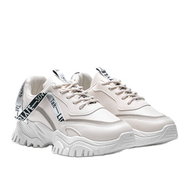Beige sneakers med en tyk Claudia sål