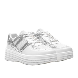 Hvide brokade sneakers på en tyk Laurel sål