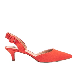 Orange eco-ruskind pumps på en Meghan hæl