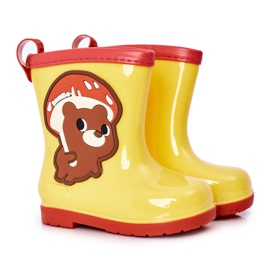Børns gule galoser med en bamse