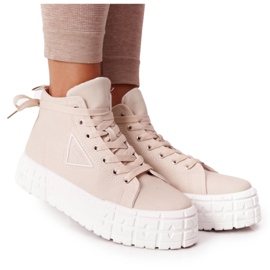 Kvinders høje sneakers på en Beige Manhattan -platform