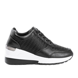Sorte kile sneakers med et flettet Dianne -mønster