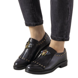 Sorte slip-on sko med GF-FD9 nitter