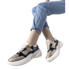 Gyldne sneakers med en høj sål Rude sort