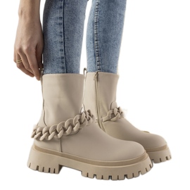Creme støvler med kædeinspiration beige