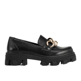 Sorte loafers på en høj Reyna sål