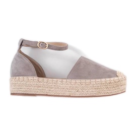 Grå espadriller på sommerplatformen beige