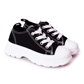 FR1 Børnesneakers på den sort-hvide rejsetidsplatform