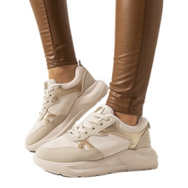 Beige sneakers med gyldne Davis-accenter