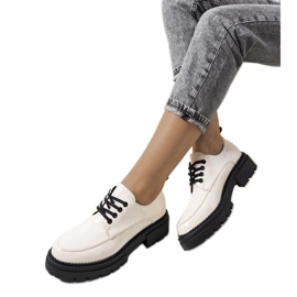 Beige brogues med Noralie traktorsål