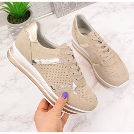 Sneakers i læder til kvinder på en beige Filippo platform