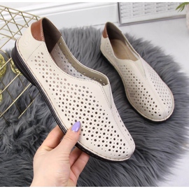 Damesko i beige gennembrudt læder Rieker 48457