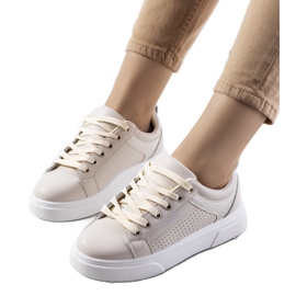 Beige sneakers med en tyk Louisianasål