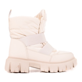 Shelovet snestøvler til kvinder på en tyk beige platform brun
