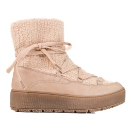 Kvinders snestøvler på den beige Shelovet platform