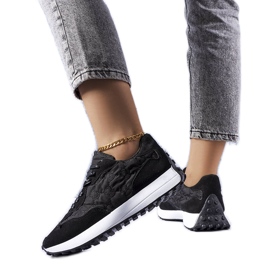 Sorte sneakers med Lanctot-monogram