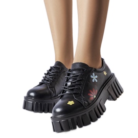 Sorte brogues dekoreret med Gemini blomster