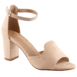 Damesandaler i ruskind på en beige post Potocki YQ21035