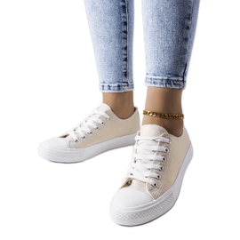 Vignette hvide skinnende sneakers beige