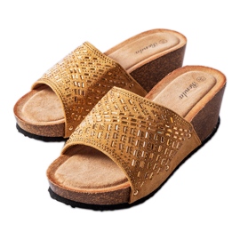 Mørke beige kilesandaler fra Guymon