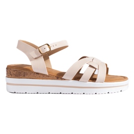 Damesandaler på en lav kile Shelovet beige