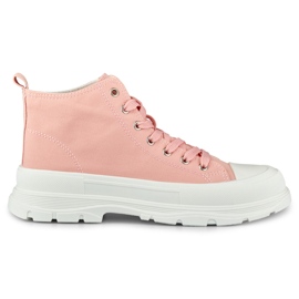 Kvinders lyserøde sneakers over anklen