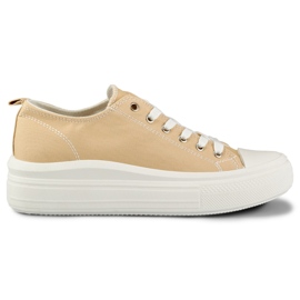 Beige sneakers på lav platform