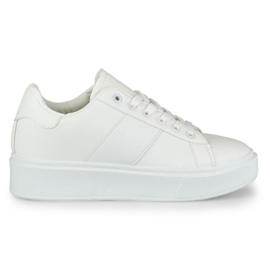 Kvinders hvide sneakers på platformen