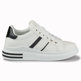 Klassiske sorte og hvide sneakers til kvinder