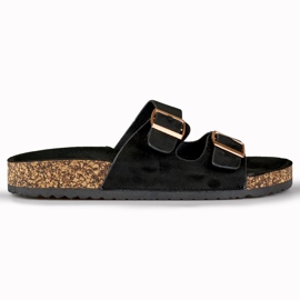 Sorte flip flops på korksål