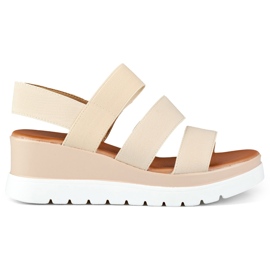Beige elastiske sandaler med lav platform