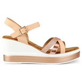 Beige kilesandaler med en skinnende rem