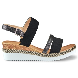 Sorte damesandaler på en lav kile