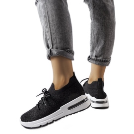 Inna Sorte sneakers dekoreret med en skinnende Randolph-tråd