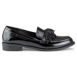 Elegante patent sorte damesko med dekoration