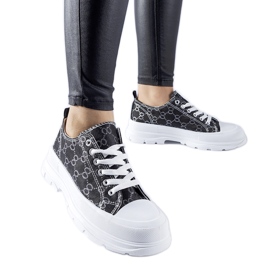 Sorte sneakers dekoreret med Antonella-monogrammet