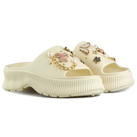 Damebeige gummiflip-flops med dekorationer