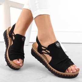 Komfortable sorte slip-on wedge sandaler til kvinder Rieker V7972-00
