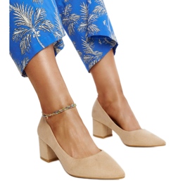 Beige højhælede pumps med et parisisk læderindlæg