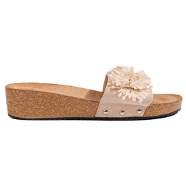 Kvinders beige ruskindsko med blomster