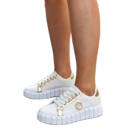 Hvide og guld sneakers med en massiv Bionda sål