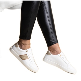 Hvide og guld sneakers med en dekorativ Grada stribe