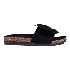 Sorte flip flops på korksål