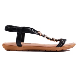 Sorte kvinders flade sandaler med dekorationer