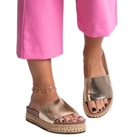 Guldflip-flops med en dekorativ Jasmin-sål gylden