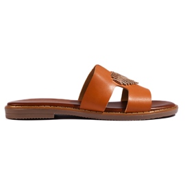 Brune elegante flip-flops med et gyldent hjerte