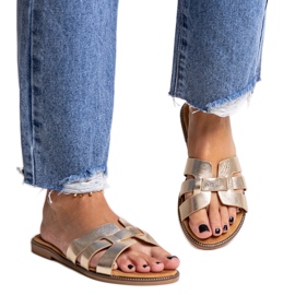 Klassiske flip-flops i guld med Umayma dekoration gylden