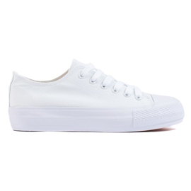 Kvinders hvide sneakers på platformen